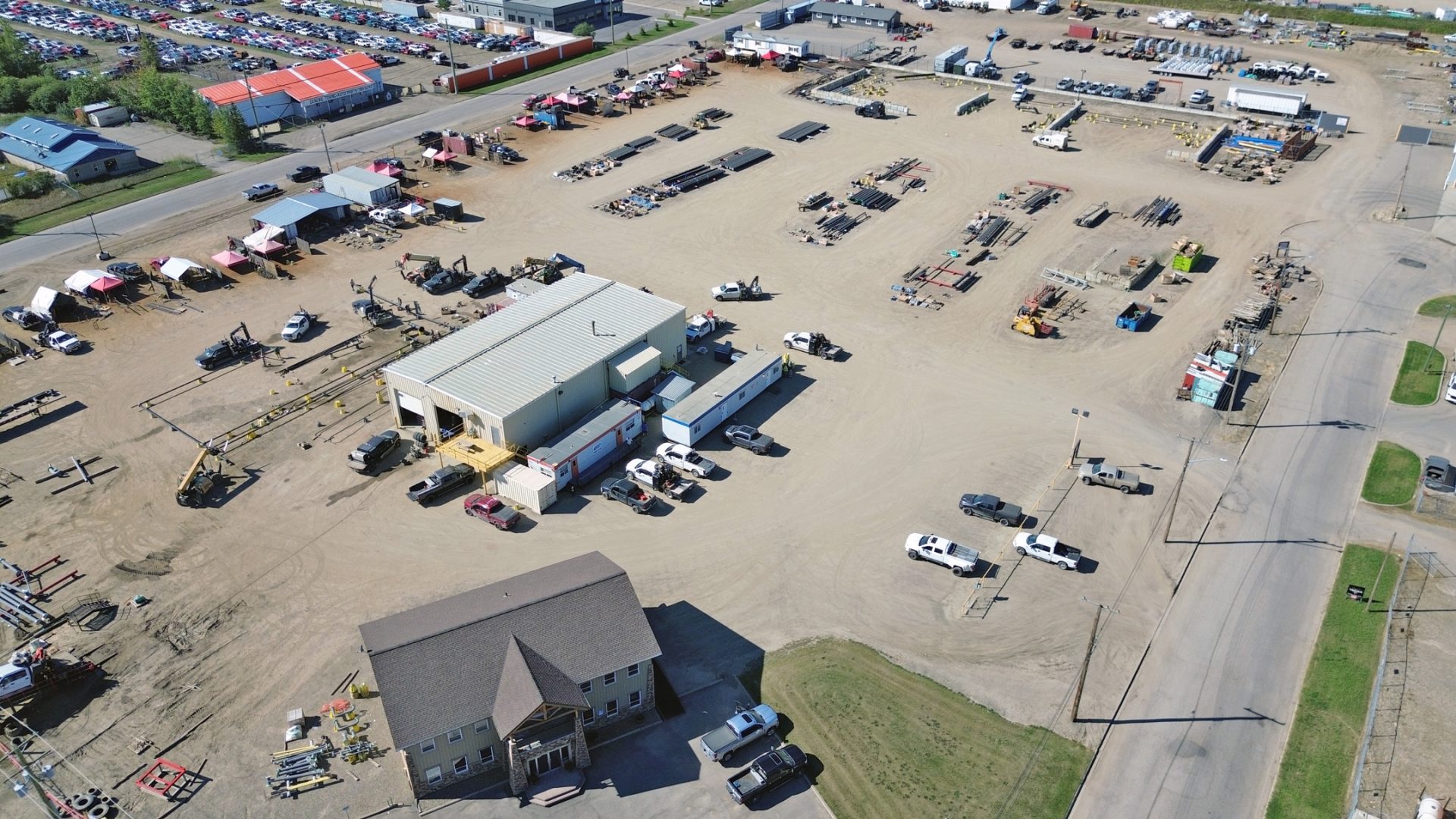 Aerial photo of one of the MVP Oilfield Services Inc. yards, showing a wide variety of materials neatly organized.