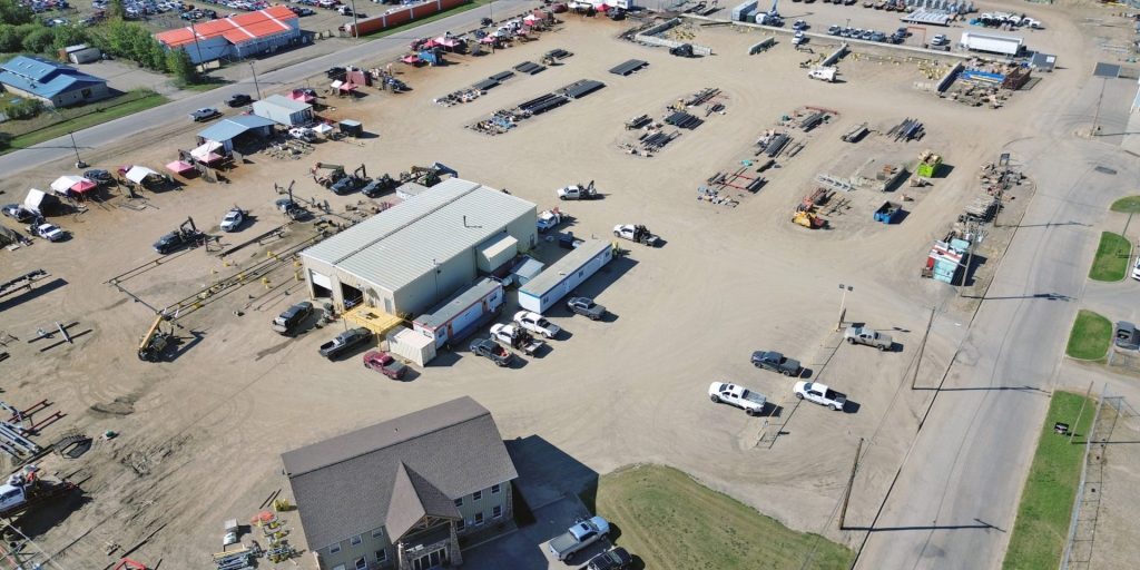 Aerial photo of one of the MVP Oilfield Services Inc. yards, showing a wide variety of materials neatly organized.